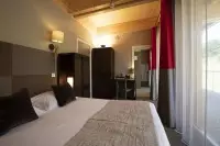 Master bedroom L'Aiguille Grive Chalets Hôtel